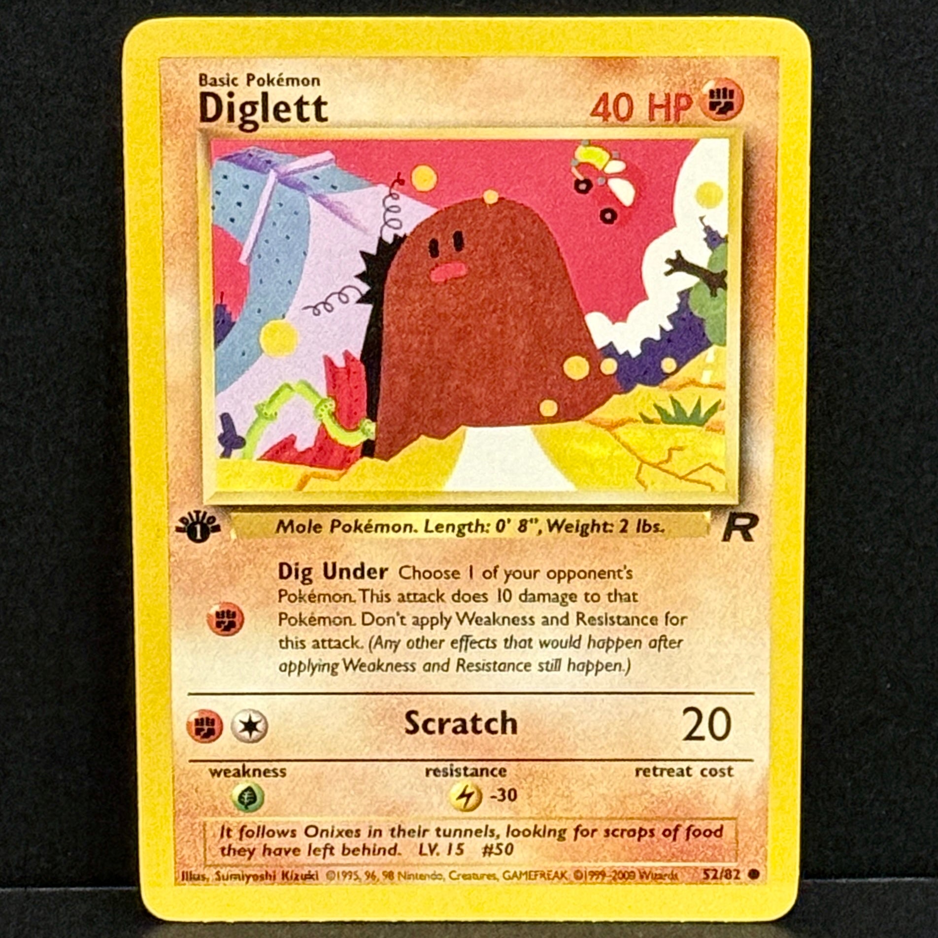 2000 Pokemon Team Rocket 052/082 Diglett Common 1st Edition