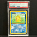 2000 Pokemon Team Rocket 065/082 Psyduck Common 1st Edition PSA 7