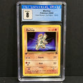 2000 Pokemon Team Rocket 059/082 Machop Common 1st Edition CGC 8